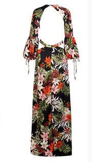 A Shanti cutout flower maxi dress by Nik Spruill with a floral pattern on it.