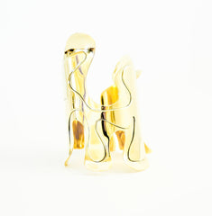 A pair of Nik Spruill OSHUN glasses sitting on top of each other.