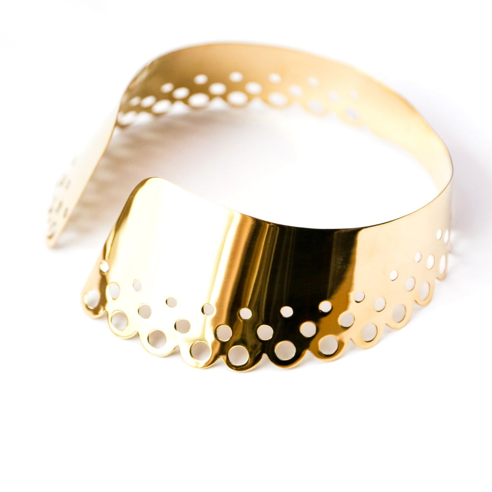 A close up of a Nik Spruill DAHOMEY bracelet on a white background.
