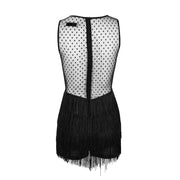 A Nik Spruill black and white Lauren Fringe Romper with polka dots.