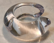 a Nik Spruill Bubble Cuff sitting on top of a table.