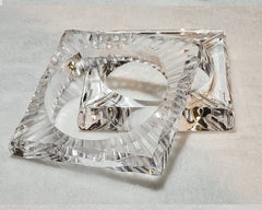 A pair of Nik Spruill's FROSTY glass dishes sitting on top of a table.